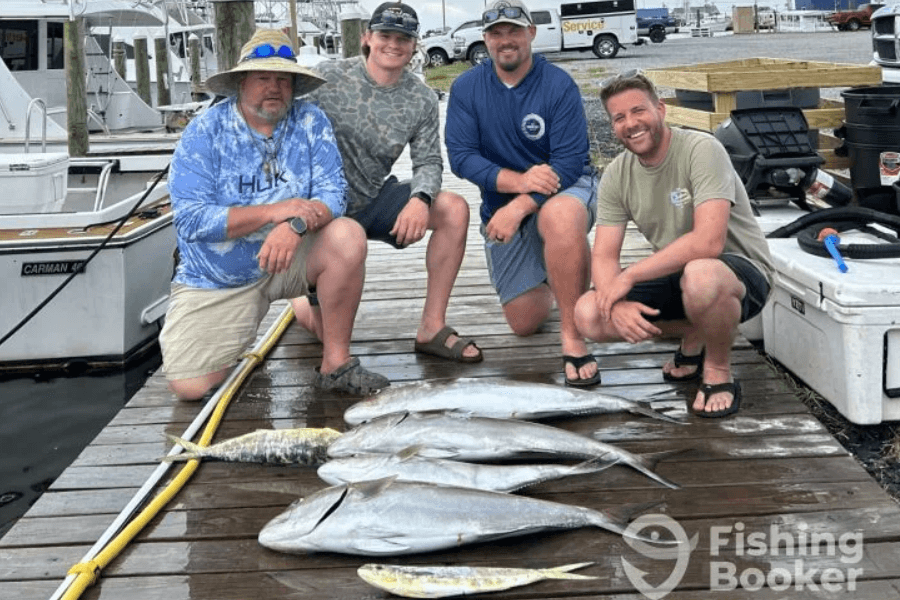  Clients with catch of 4 amberjack and 2 mahi at dock